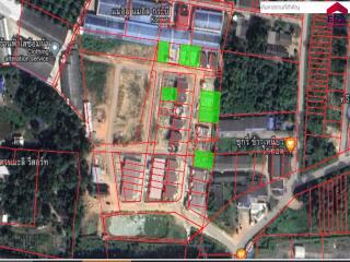 Aerial view of a neighborhood layout with marked plots