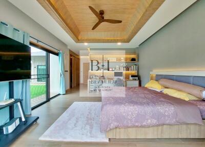 Modern bedroom with elegant decor and ceiling fan