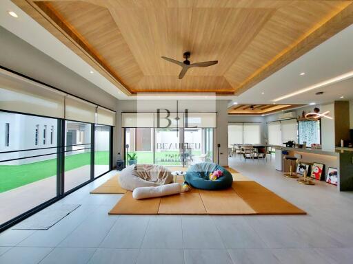 Spacious open-plan main living area with modern design and ample natural light