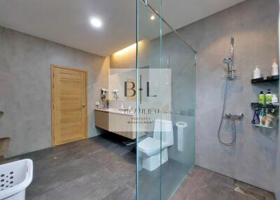 Modern bathroom with glass shower enclosure