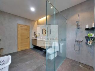 Modern bathroom with glass shower enclosure