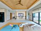 Spacious and modern living room with wooden ceiling and comfortable seating