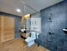 Modern bathroom with walk-in shower and wooden flooring