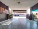 Spacious carport with tiled flooring