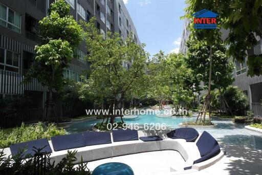 Outdoor seating area with garden and pool
