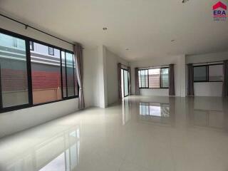 Spacious living room with large windows