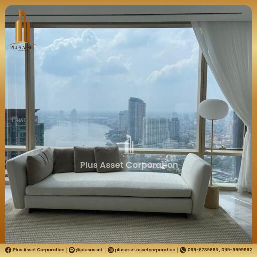 Living room with a panoramic city and river view