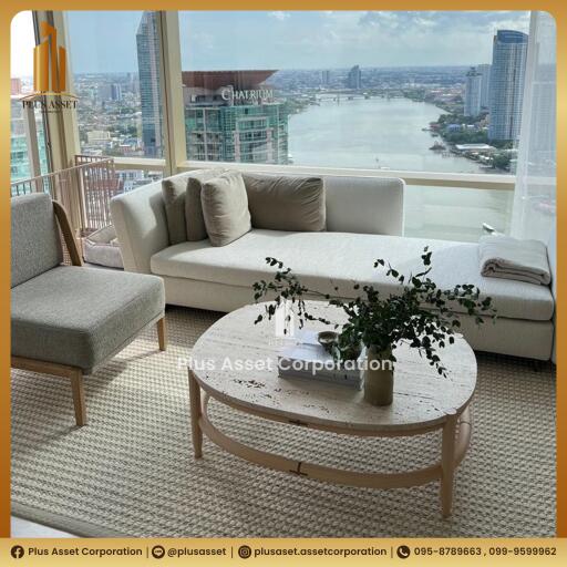 Modern living room with a large window view of the city and river