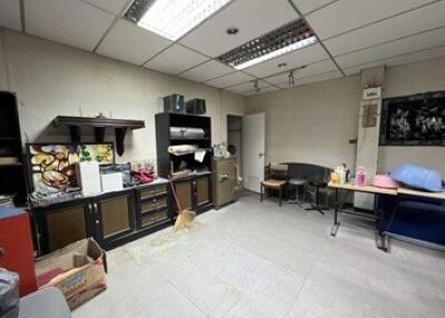 A spacious utility room with shelves and storage