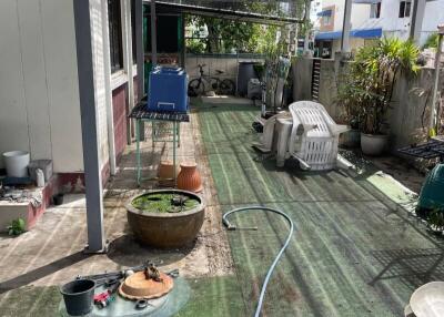 Patio with garden and seating area