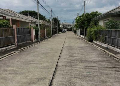 Quiet residential street with houses