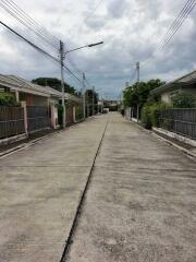 Quiet residential street with houses