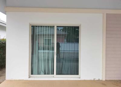 Sliding glass door on building exterior