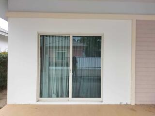 Sliding glass door on building exterior