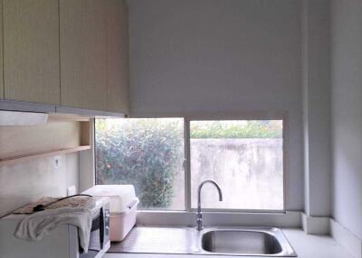 Compact kitchen with a window