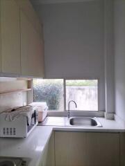 Compact kitchen with a window
