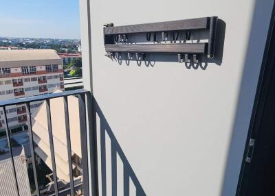 Balcony with a view and a wall-mounted rack