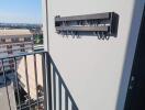 Balcony with a view and a wall-mounted rack