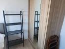 Bedroom with wardrobe and shelves