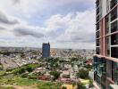 City view from high-rise building balcony