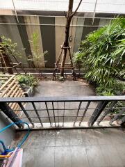 Balcony with a view of greenery and potted plants