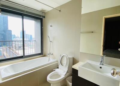 Modern bathroom with large window