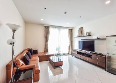 Spacious living room with modern furniture and entertainment setup