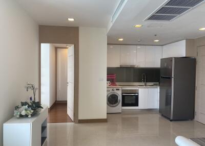 Modern kitchen with appliances and white cabinetry