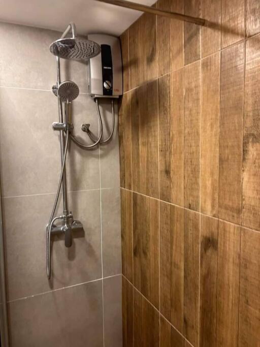 Modern shower area with water heater