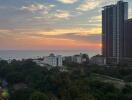 City skyline with high-rise buildings at sunset