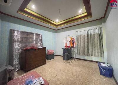 Spacious room with furniture and clothing storage