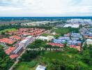 Aerial view of a residential neighborhood with houses and greenery