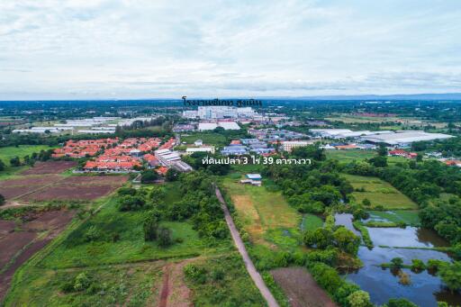 Aerial view of a residential area and farmlands