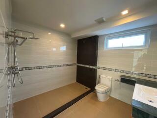 Spacious bathroom with modern fixtures