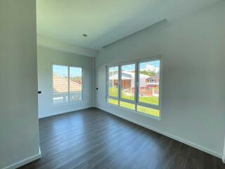 Spacious and bright living room with large windows