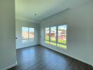 Spacious and bright living room with large windows