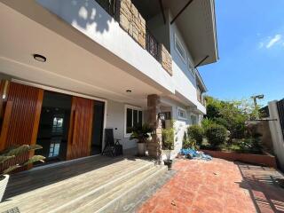 Exterior view of a modern building with a spacious patio