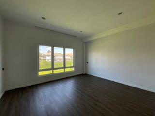 Bright empty living room with large window