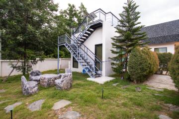 Outdoor area with staircase and seating