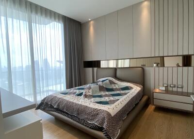 Modern bedroom with large window