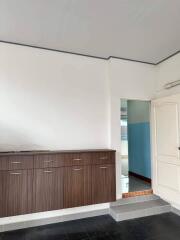 Kitchen with wall-mounted cabinets