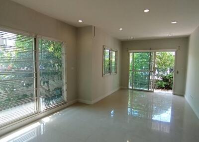 Bright and spacious living room with large windows