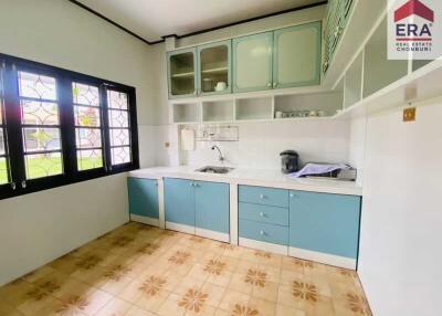 Modern kitchen with blue and white cabinets