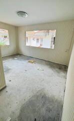 Empty bedroom with windows