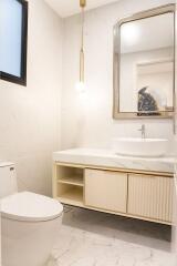 Modern bathroom with vanity and mirror