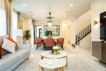 Elegant living room with dining area and modern decor