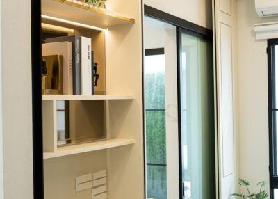 Modern interior with bookshelf and sliding door