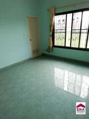 Empty bedroom with tiled floor