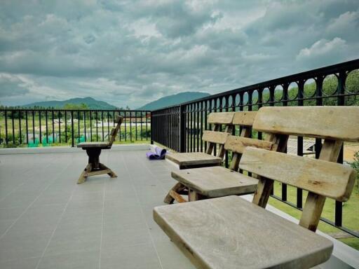Spacious outdoor balcony with mountain views