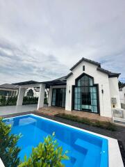 Modern house exterior with swimming pool